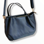 Borsa ovale in vera pelle con tracolla regolabile